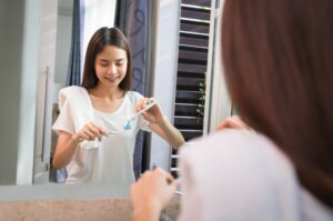 How to brush teeth with braces WeSmile Dental