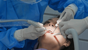 Dentist with female patient