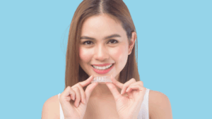 Woman showing her invisalign