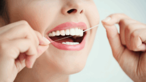 Woman Flossing